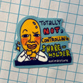Sticker with a cartoon character and text on a grid background